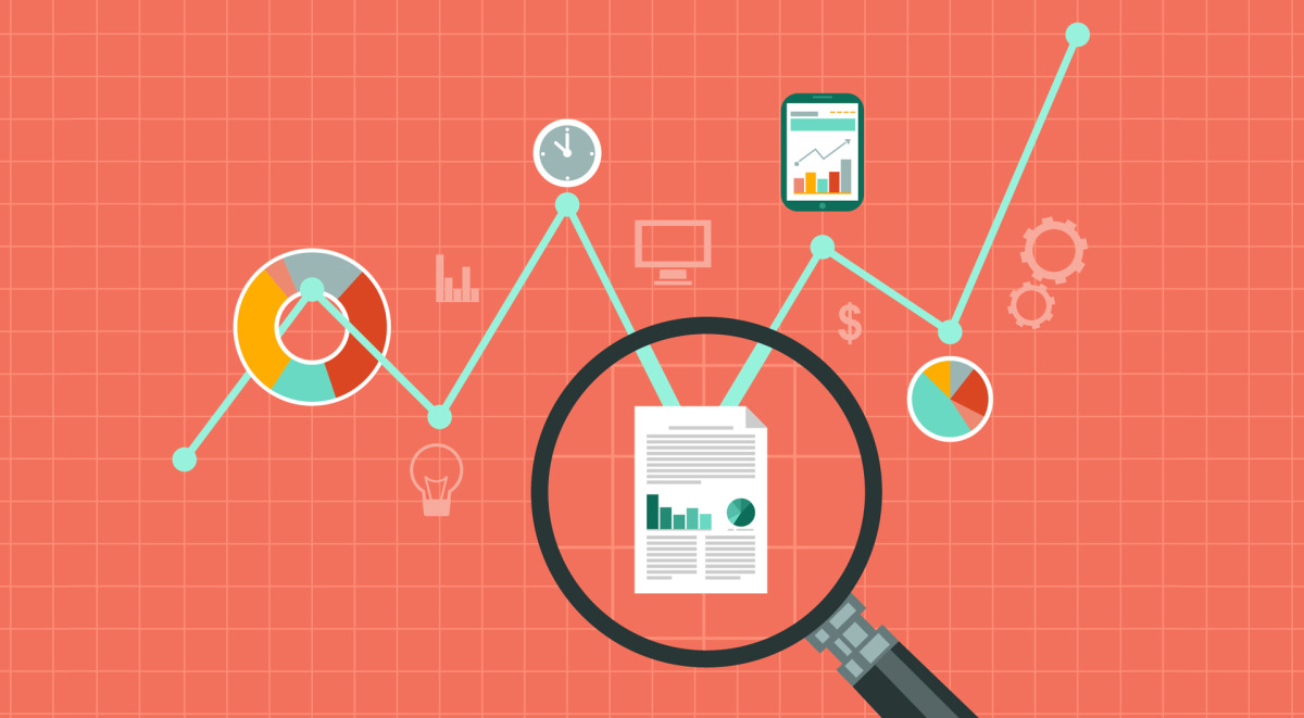 A magnifying glass over a document and graphs.