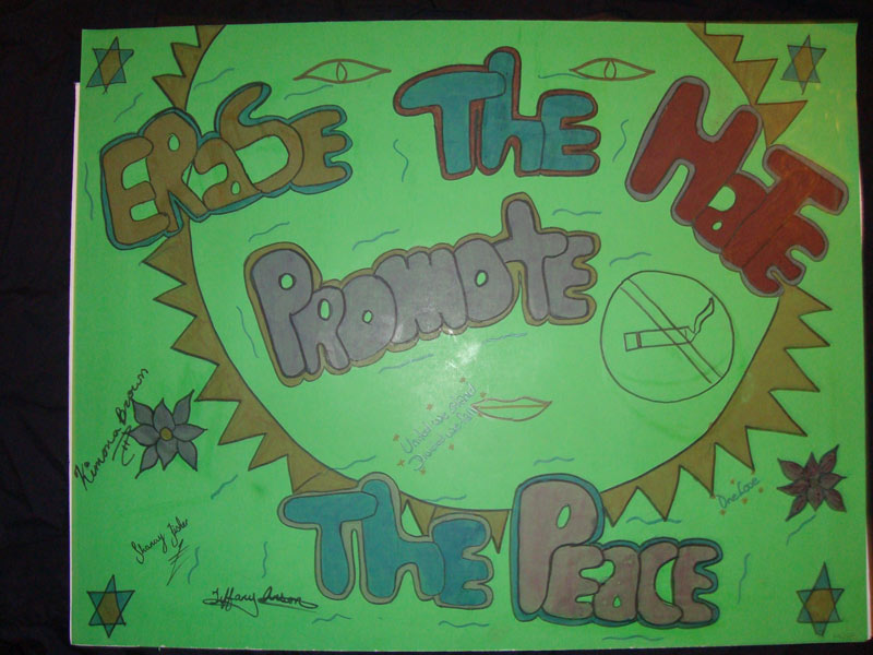 A poster with the words'end the hole promote the peace'on it.
