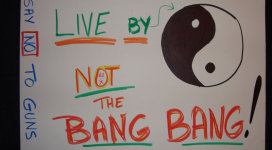 A sign that says live by by not the bang bang.