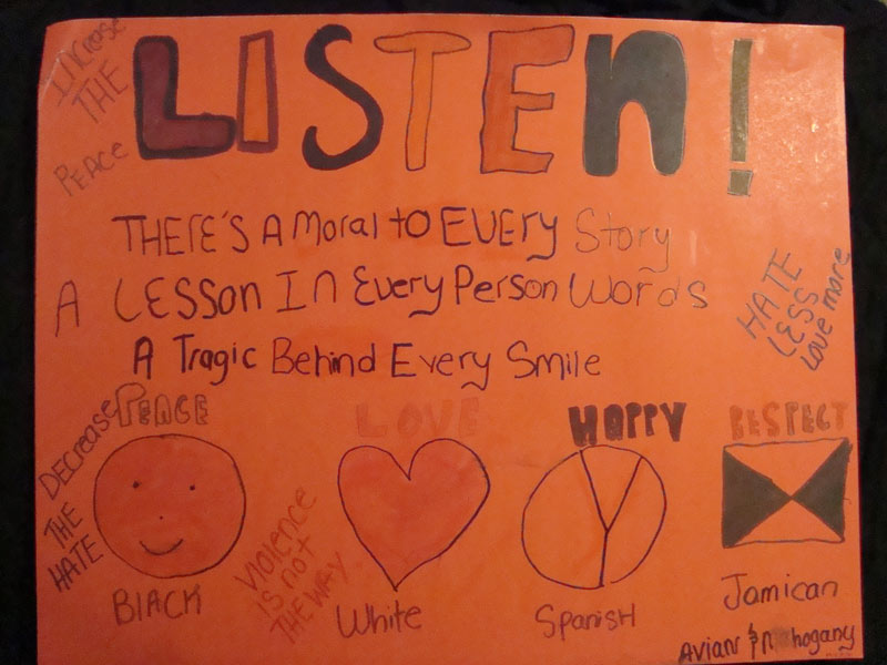 A poster with the words listen on it.