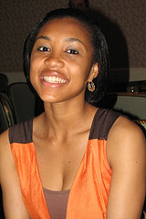 A young woman smiling at the camera.