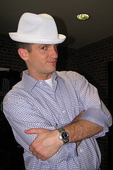 A man wearing a white hat.