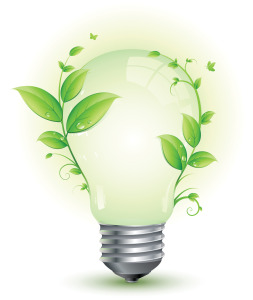 Here's an alt tag for the image: Green leaves around a lightbulb; eco-friendly idea.